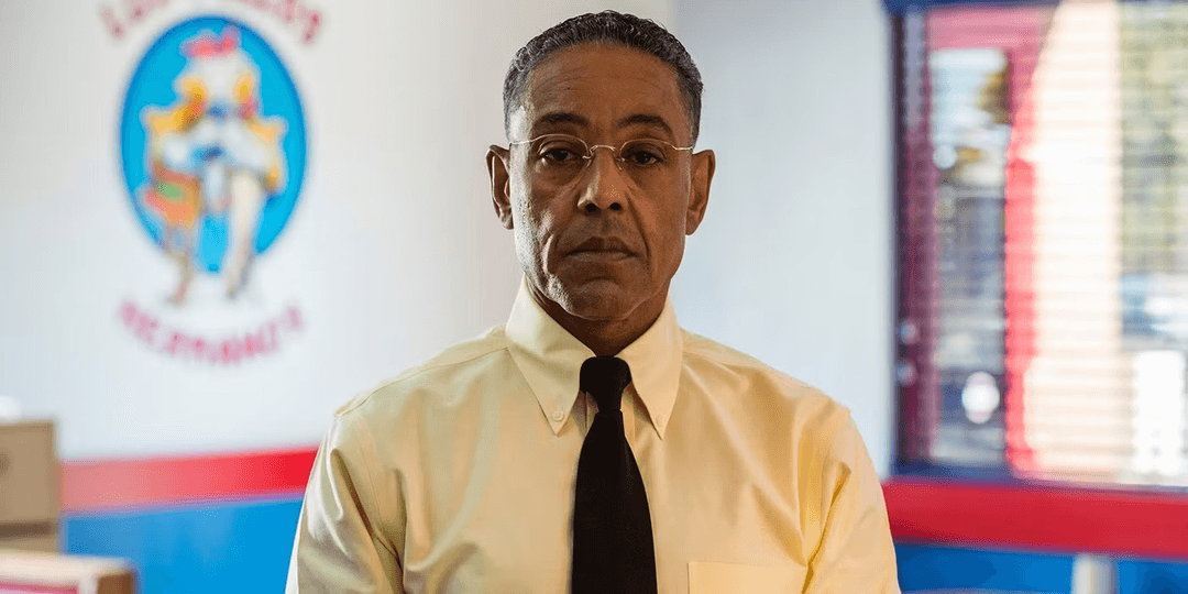 gustavo fring looking into the camera wearing a shirt and a tie.