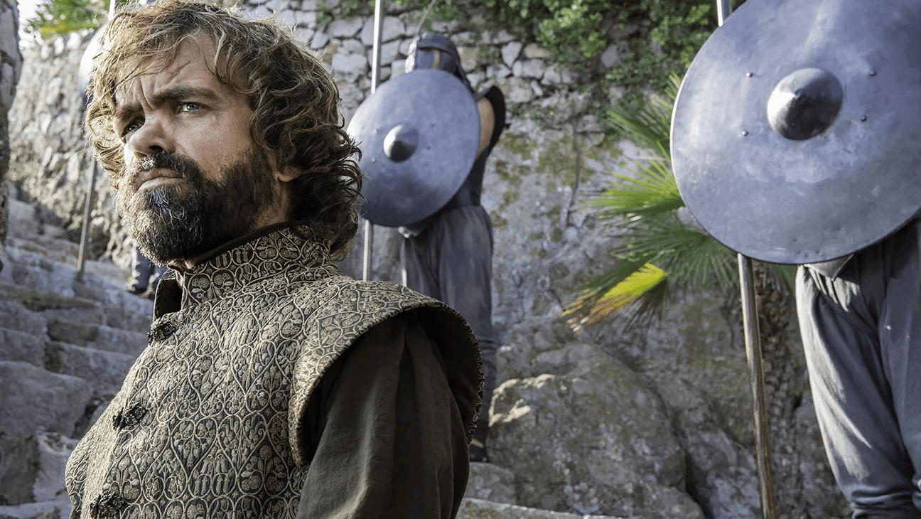 Tyrion standing and thinking about something