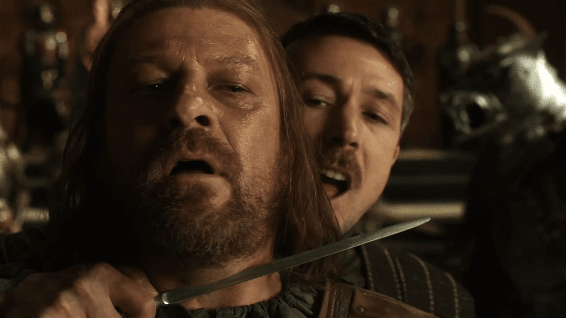 Petyr Baelish holding a dagger over Ned Stark's neck in Game of Thrones