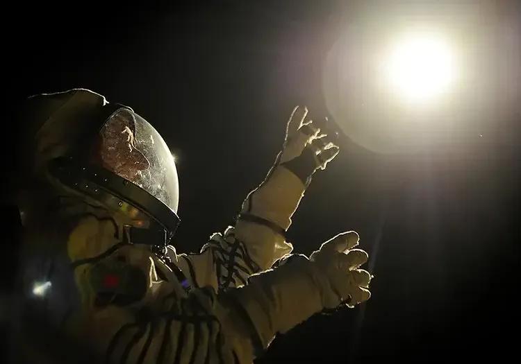 Ryan Gosling looking at space in Project Hail Mary